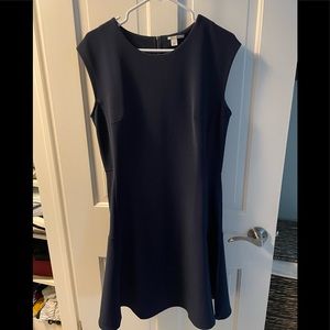 Sheath dress with flared skirt